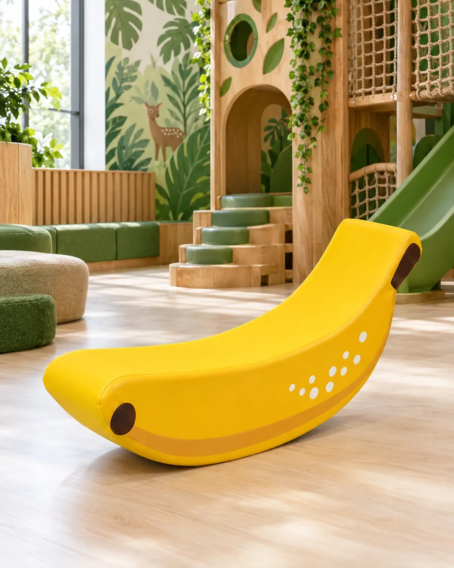 PlayCurator Banana Soft Play Rocker — Yellow 1 Yellow banana Soft Play Rocker in a jungle theme indoor playground