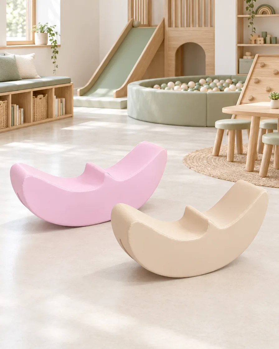PlayCurator Boat Soft Play Rocker — Pink & Apricot 1 Pink & Apricot boat Soft Play Rocker in a Scandinavian soft play cafe indoor playground