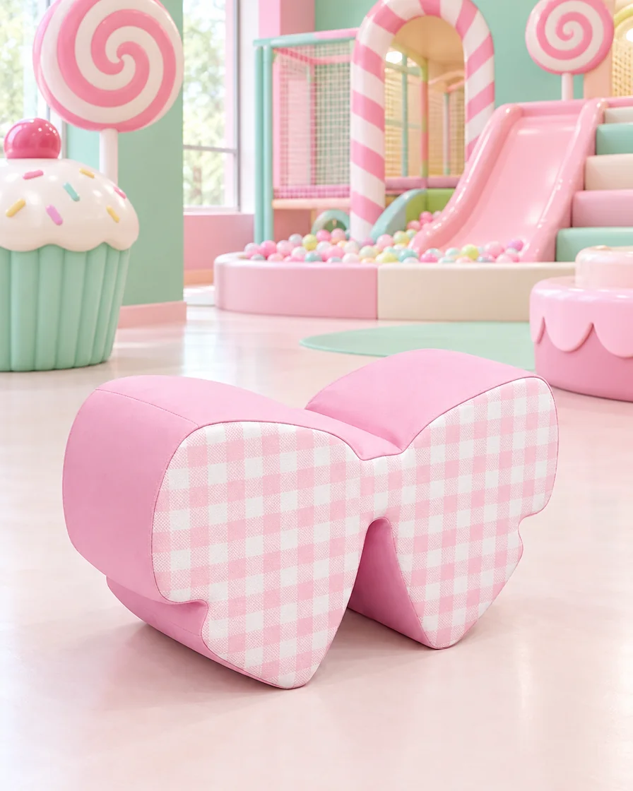 Bow Soft Play Seat Pink in a candy theme indoor playground