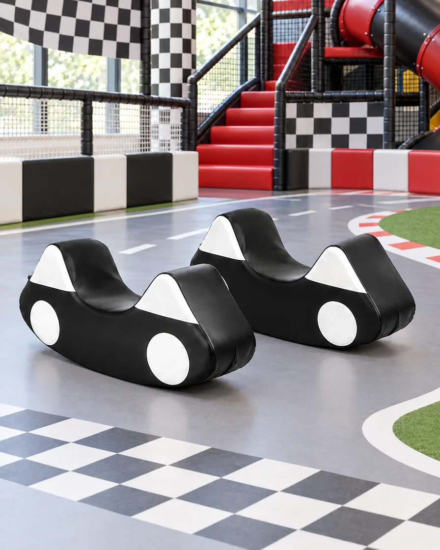 PlayCurator Cartoon Car Soft Play Rocker — Black & White 1 Black & White cartoon Car Soft Play Rocker in a racing theme zone indoor playground