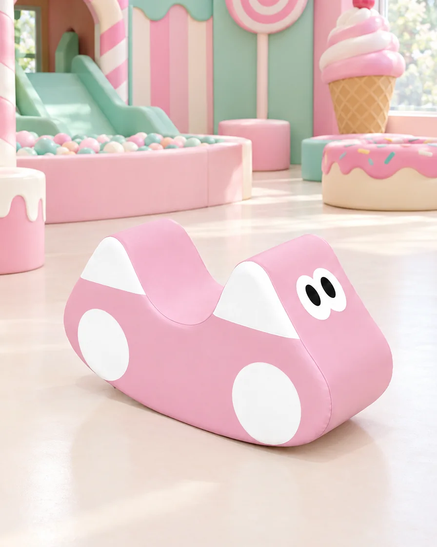 PlayCurator Cartoon Car Soft Play Rocker — Pink 1 Pink cartoon Car Soft Play Rocker in a candy theme indoor playground