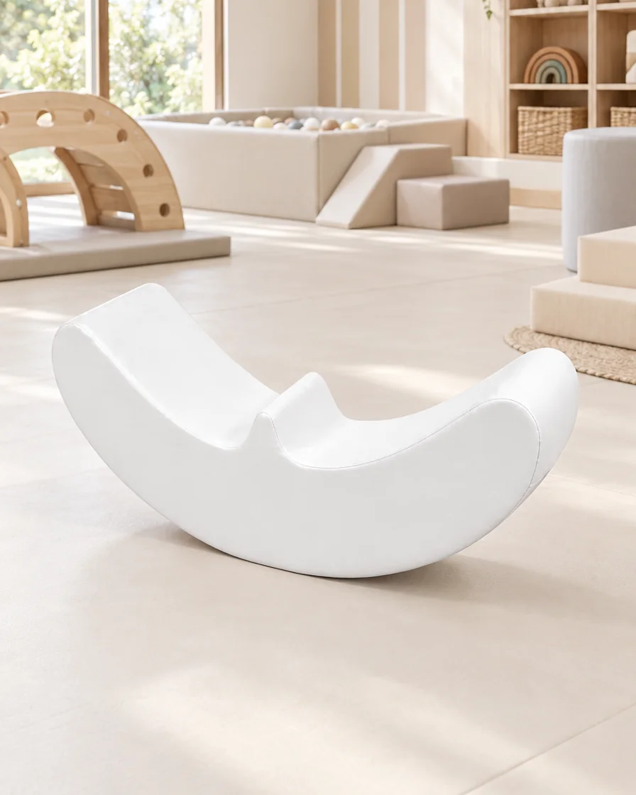 PlayCurator Crescent Balance Soft Play Rocker — White 1 White crescent Balance Soft Play Rocker in a soft play center indoor playground