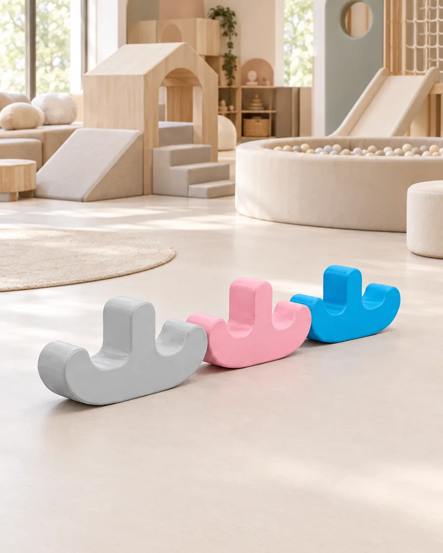 Grey, Pink & Blue double-Seat Soft Play Rocker in a soft play center indoor playground