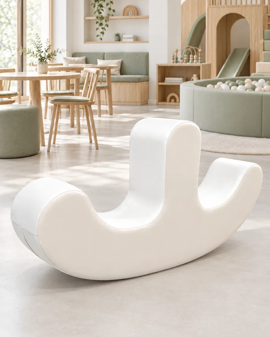 PlayCurator Double-Seat Soft Play Rocker — Ivory 1 Ivory double-Seat Soft Play Rocker in a Scandinavian soft play cafe indoor playground