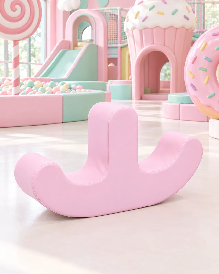 PlayCurator Double-Seat Soft Play Rocker — Light Pink 1 Light Pink double-Seat Soft Play Rocker in a candy theme indoor playground