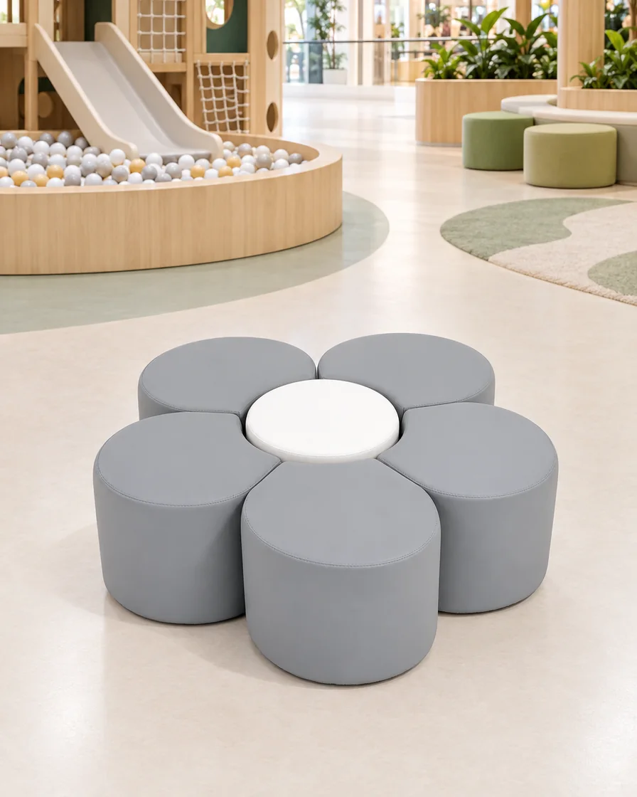 Grey & White five-Petal Flower Soft Play Seating in a mall play zone indoor playground