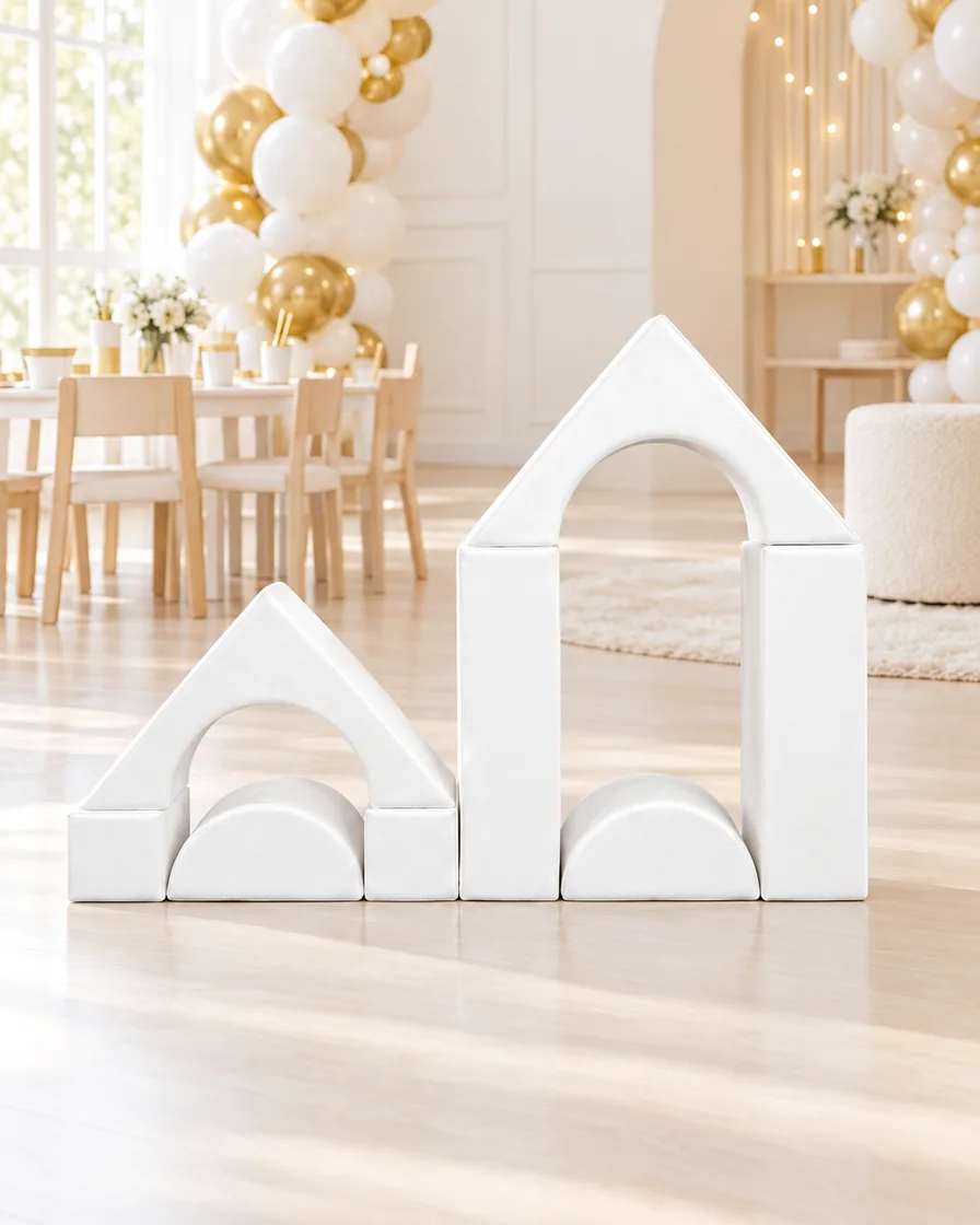 PlayCurator House Arch & Triangle Soft Play Block Set — White 1 White house Arch & Triangle Soft Play Block Set in a kids party room indoor playground