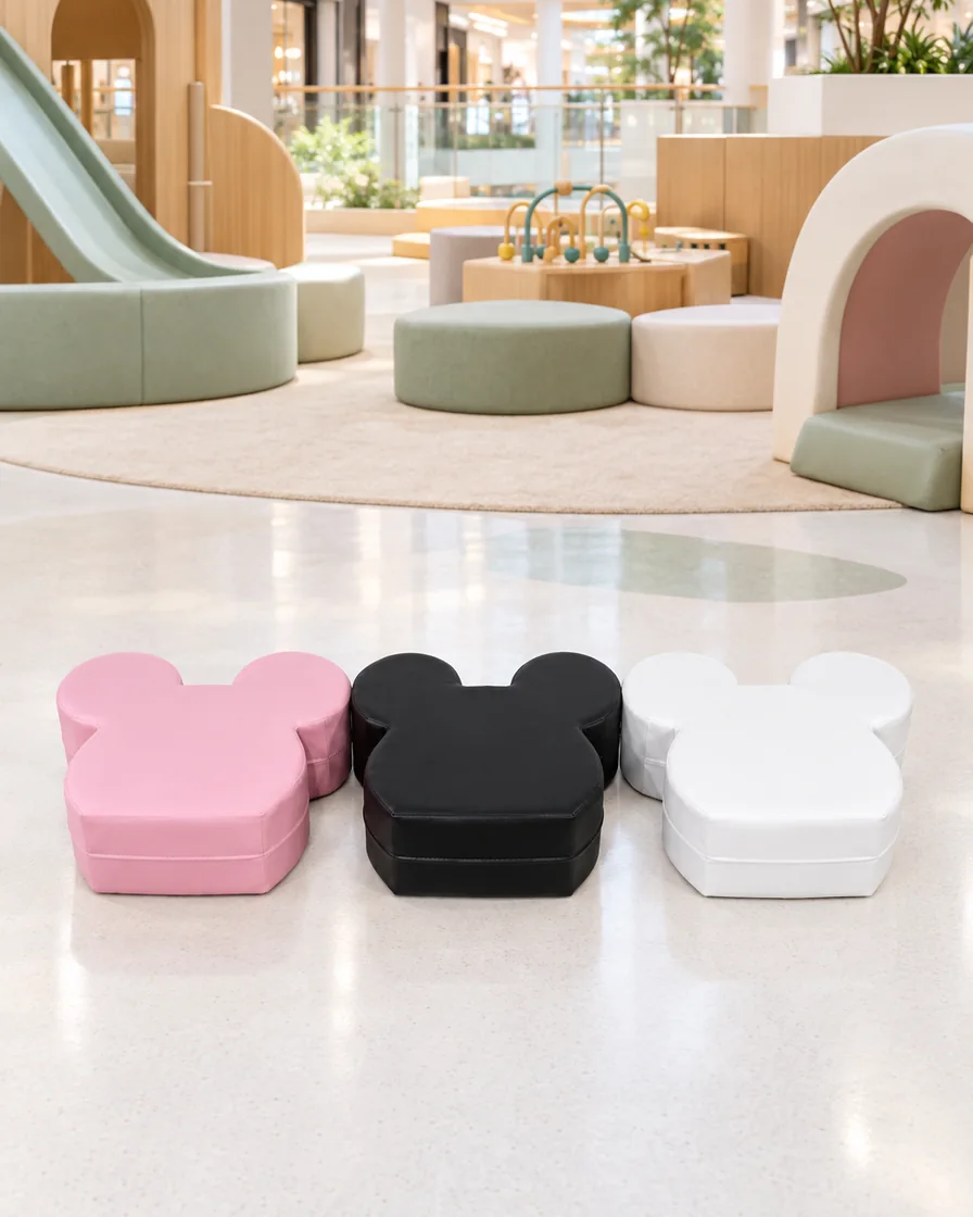 Pink, Black & White mouse Ears Soft Play Stool in a mall play zone indoor playground