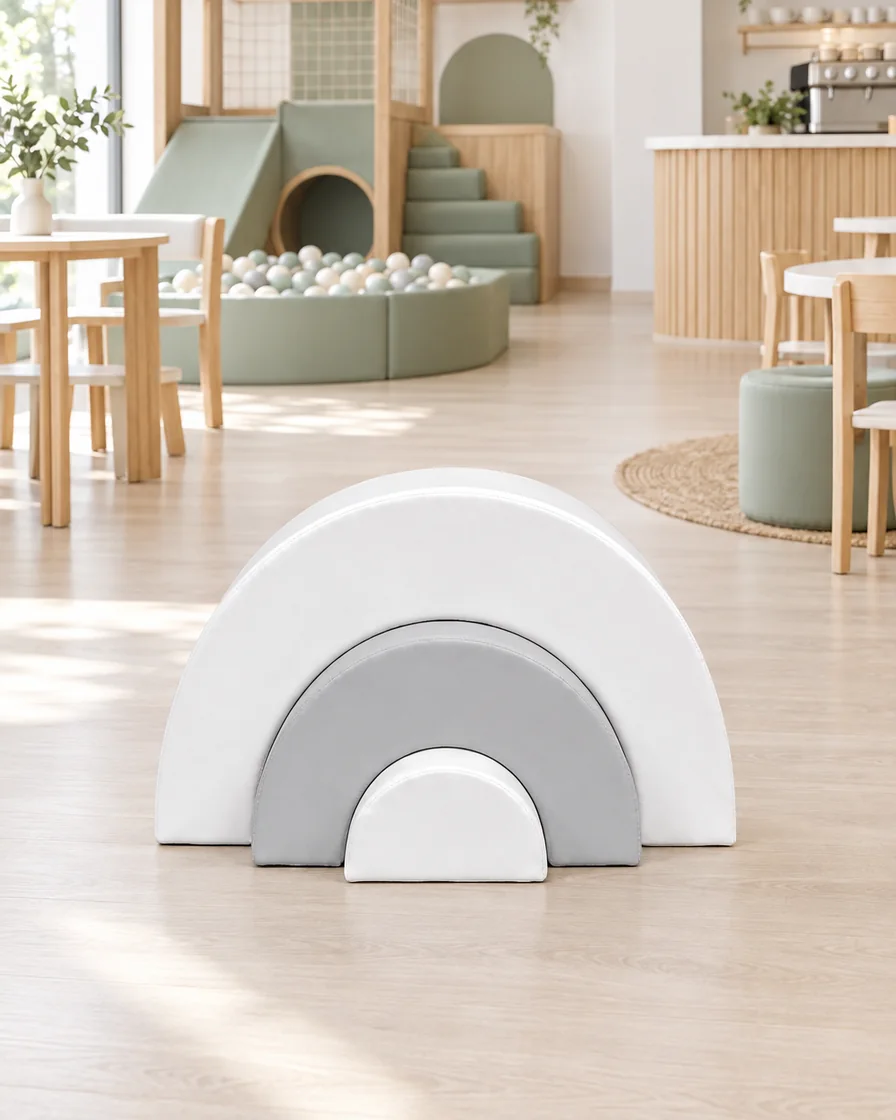 White & Grey nested Rainbow Soft Play Arches in a Scandinavian soft play cafe indoor playground