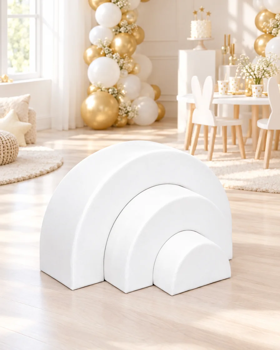 White nested Rainbow Soft Play Arches in a kids party room indoor playground
