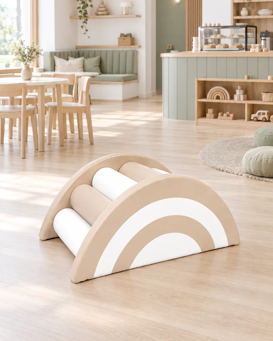 Beige & White rainbow Roller Soft Play Bridge in a Scandinavian soft play cafe indoor playground