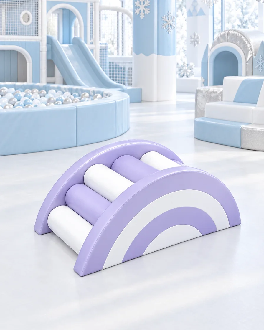 PlayCurator Rainbow Roller Soft Play Bridge — Lavender & White 1 Lavender & White rainbow Roller Soft Play Bridge in a ice and snow theme indoor playground