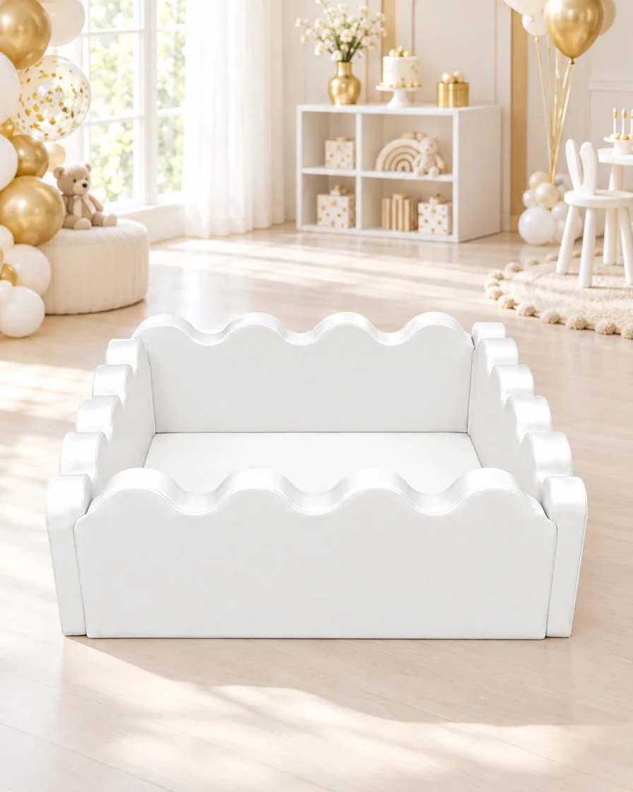 PlayCurator Scalloped Square Soft Play Ball Pit — White 1 White scalloped Square Soft Play Ball Pit in a kids party room indoor playground