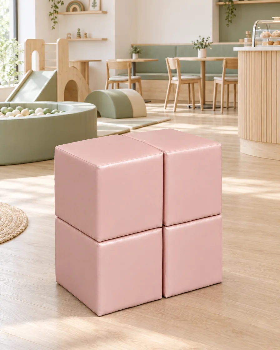 PlayCurator Soft Play Cube, 30 cm — Blush Pink 1 Soft Play Cube, 30 cm Blush Pink in a Scandinavian soft play cafe indoor playground