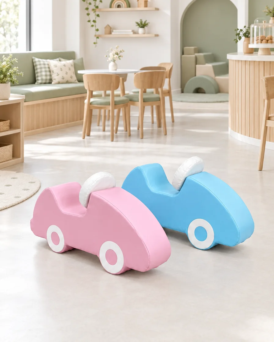 Pastel Pink & Blue soft Play Foam Car in a Scandinavian soft play cafe indoor playground