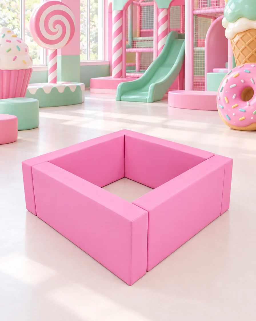 Hot Pink square Soft Play Ball Pit in a candy theme indoor playground