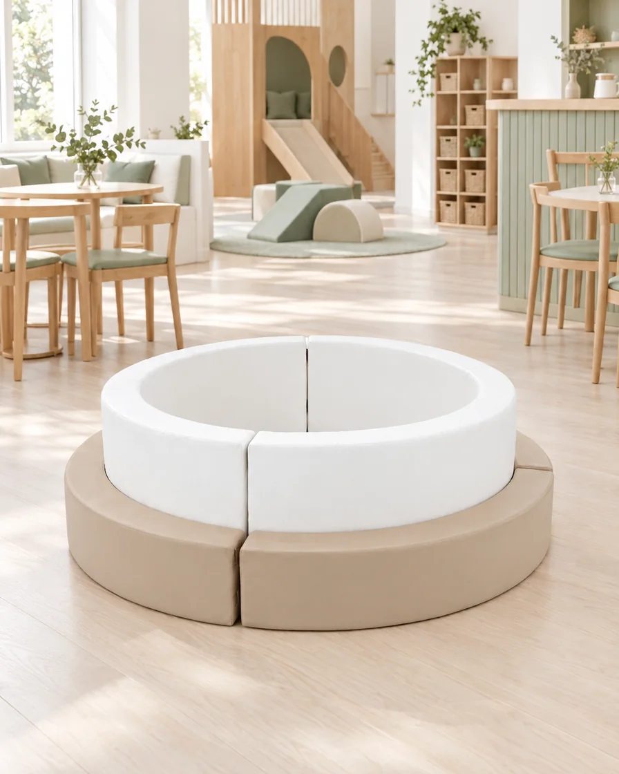 PlayCurator Tiered Round Soft Play Ball Pit — White & Beige 1 White & Beige tiered Round Soft Play Ball Pit in a Scandinavian soft play cafe indoor playground