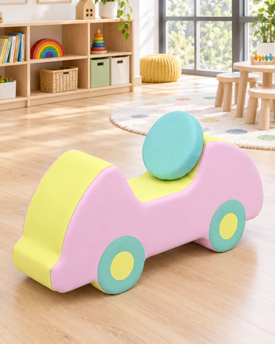 PlayCurator Two-Tone Soft Play Foam Car — Pink, Yellow & Mint 1 Pink, Yellow & Mint two-Tone Soft Play Foam Car in a kindergarten playroom indoor playground