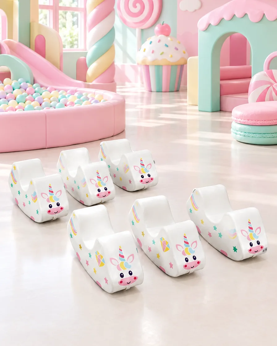 White unicorn Soft Play Rocker in a candy theme indoor playground